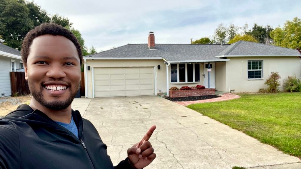 A self portrait of Mandlenkosi Vana outside the Steve Jobs garage whilst on his mindful travel adventure to the USA